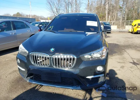 2018 BMW X1 xDrive28I z USA, uszkodzony, nr VIN WBXHT3C39J5L26260